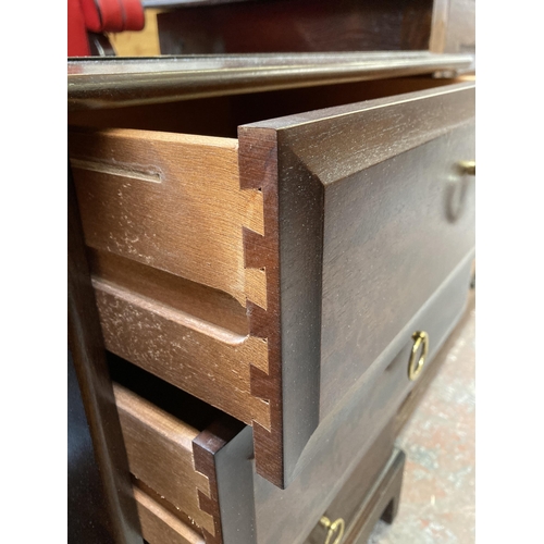 63 - A pair of Stag Minstrel mahogany bedside chests of drawers - approx. 72cm high x 52cm wide x 46cm de... 