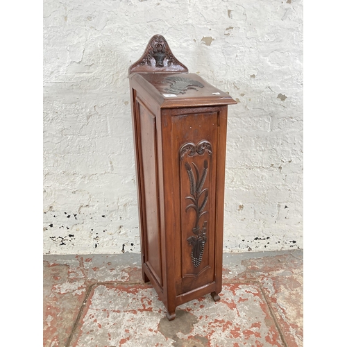 64 - A 19th century style French carved mahogany baguette box - approx. 101cm high x 26cm wide x 31cm dee... 