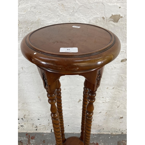 65 - A 19th century style mahogany barley twist two tier jardinière stand - approx. 102cm high x 27cm dia... 