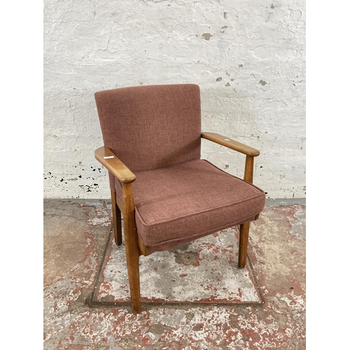 80 - A mid 20th century Parker Knoll PK733 beech and fabric upholstered armchair