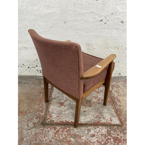 80 - A mid 20th century Parker Knoll PK733 beech and fabric upholstered armchair
