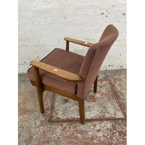 80 - A mid 20th century Parker Knoll PK733 beech and fabric upholstered armchair