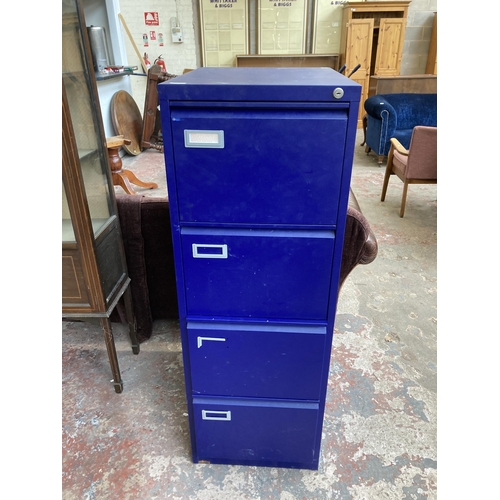 82 - A blue metal four drawer office filing cabinet - approx. 135cm high x 46cm wide x 62cm deep