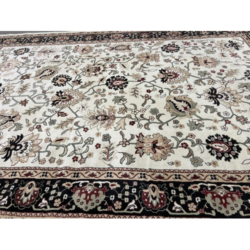 85 - A large Persian Carpet Export Development Co. floral patterned rug - approx. 500cm x 350cm