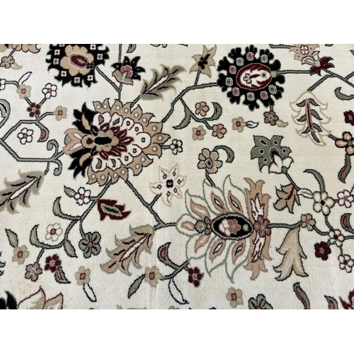 85 - A large Persian Carpet Export Development Co. floral patterned rug - approx. 500cm x 350cm