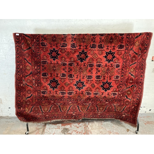 90 - A Persian hand woven rug - approx. 260cm x 200cm