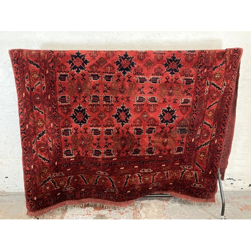 90 - A Persian hand woven rug - approx. 260cm x 200cm