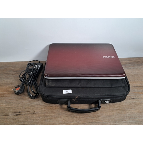 766 - A Samsung NP-R530 Notebook with power supply and carry case