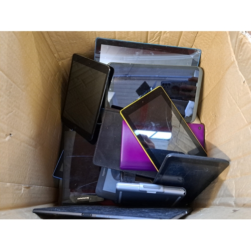 767 - Two boxes, one containing tablet cases and one containing technology items and damaged tablets to in... 