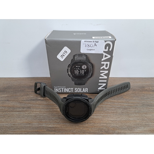 780A - A boxed Garmin Instinct Solar GPS Smartwatch