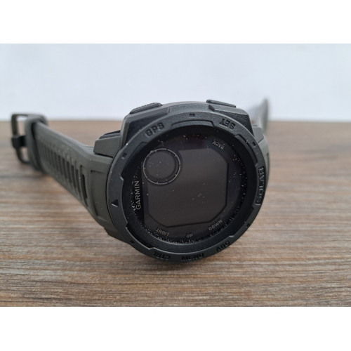 780A - A boxed Garmin Instinct Solar GPS Smartwatch