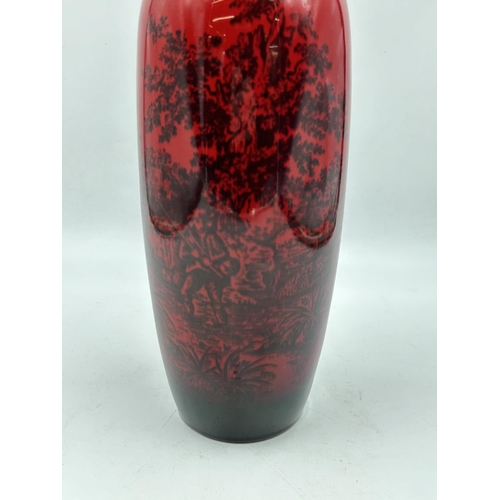 301 - A Royal Doulton Flambe Woodcut no. 1617 vase - approx. 32cm high