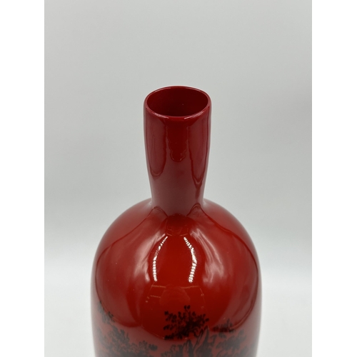 301 - A Royal Doulton Flambe Woodcut no. 1617 vase - approx. 32cm high