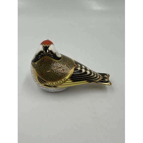 302 - A Royal Crown Derby Goldfinch paperweight with gold stopper - approx. 6cm high