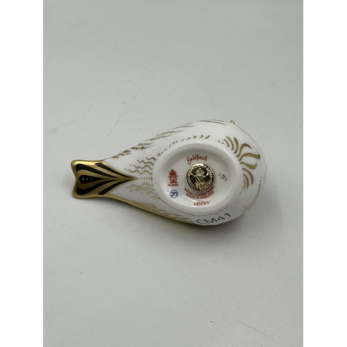 302 - A Royal Crown Derby Goldfinch paperweight with gold stopper - approx. 6cm high