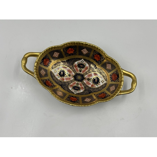 308 - A Royal Crown Derby Old Imari 1128 twin handled oval footed trinket dish - approx. 5.5cm high x 13cm... 