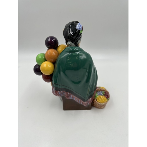 309 - A Royal Doulton The Old Balloon Seller figurine - HN1315