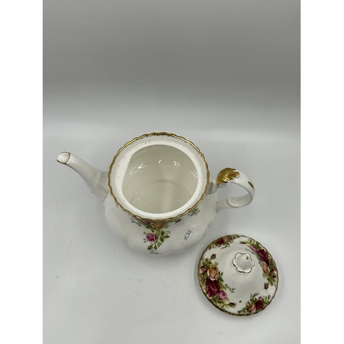 311 - A Royal Albert Old Country Roses three piece tea set comprising teapot, milk jug and sugar bowl