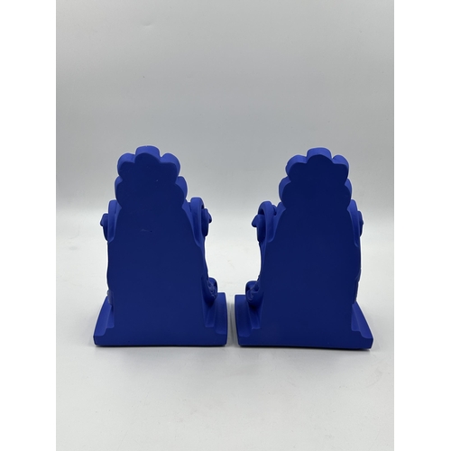 319 - A pair of boxed Liberty Sophia Oceanid ultra blue ceramic bookends - approx. 21cm high