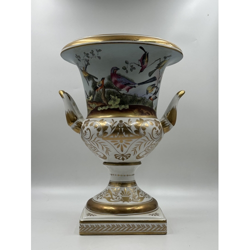 322 - A Sevres style hand painted and gilded porcelain twin handled urn vase - approx. 35cm high