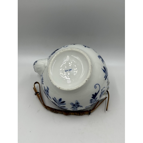 327 - Three pieces of blue and white porcelain to include Zwiebel teapot etc.