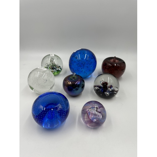 343 - Eight art glass paperweight to include four Caithness etc.