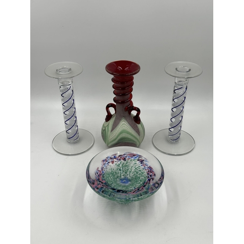 344 - Four pieces of art glassware, two candlesticks, one Spanish Lafiore Scavo twin handled vase and one ... 