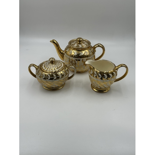 346 - A Sadler three piece tea set