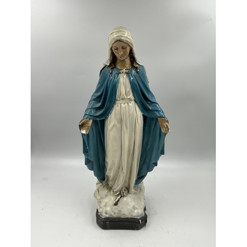 350 - A mid 20th century hand painted chalkware figurine of Mary - approx. 41cm high