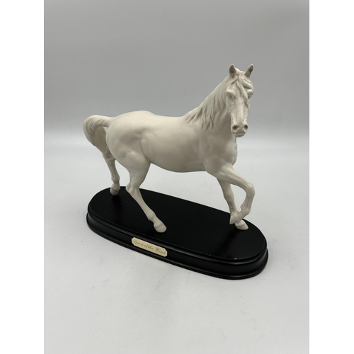 357 - A Royal Doulton Spirit of The Wind horse figurine on plinth - approx. 24cm high