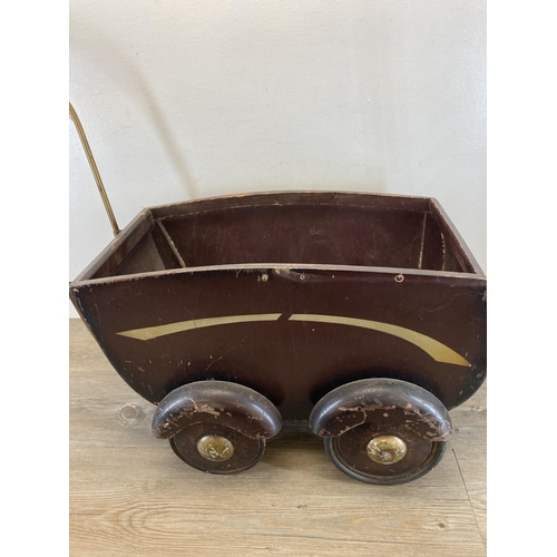 472 - A vintage style hand painted wooden dolls pram - approx. 68cm high