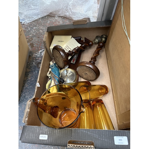 995 - A box containing pair of oak barley twist candlesticks, boxed Seiko quartz ladies wristwatch, amber ... 