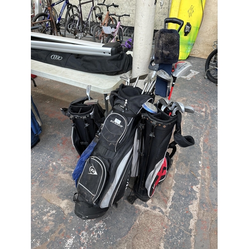 877 - Three Dunlop golf bags containing clubs to include Max Faulkner, Dunlop etc.