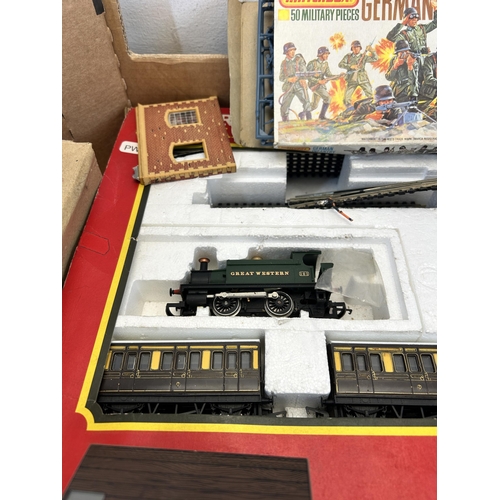 445 - A collection of mainly model railway accessories to include Hornby Railway GWR branch passenger elec... 