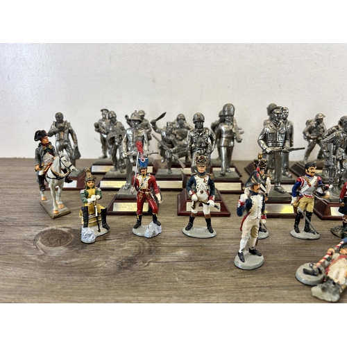 449 - A collection of military figurines to include English Miniatures The Grenadier Guards, W. Britain le... 