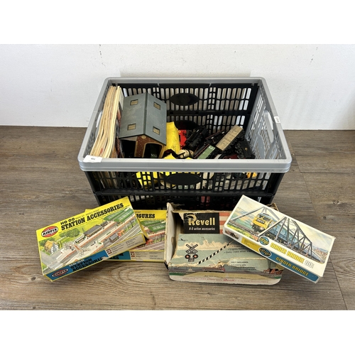 451 - A collection of model railway accessories to include boxed Airfix girder bridge, boxed Airfix statio... 