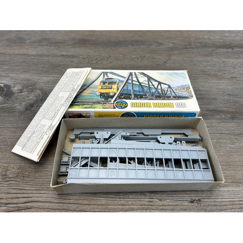 451 - A collection of model railway accessories to include boxed Airfix girder bridge, boxed Airfix statio... 