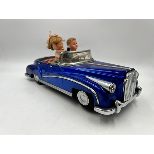 453 - A 1960s Photoing On Car Rolls Royce battery operated tinplate model vehicle