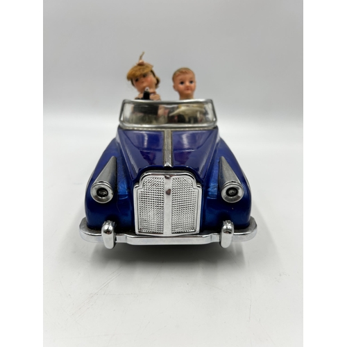 453 - A 1960s Photoing On Car Rolls Royce battery operated tinplate model vehicle