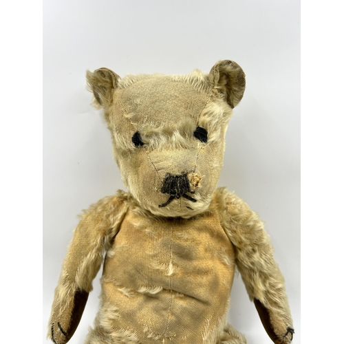 455 - A vintage teddy bear