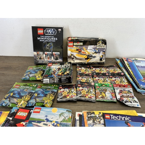 457 - A collection of Lego to include Star Wars The Essential Mini figures book collection, Star Wars no. ... 