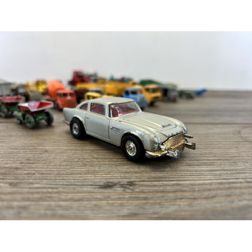 463B - A collection of vintage die cast model vehicles to include Corgi, James Bonds Austin Martin DB5, Din... 