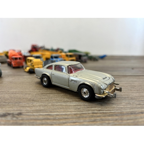 463B - A collection of vintage die cast model vehicles to include Corgi, James Bonds Austin Martin DB5, Din... 