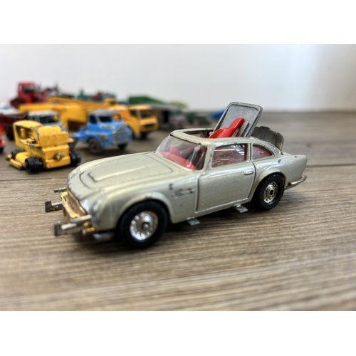 463B - A collection of vintage die cast model vehicles to include Corgi, James Bonds Austin Martin DB5, Din... 