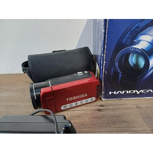 609 - Six camcorders to include boxed Sony DCR-DVD310E, Panasonic SDR-S50 with instruction manual and soft... 