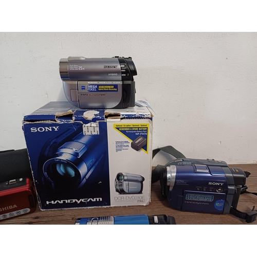 609 - Six camcorders to include boxed Sony DCR-DVD310E, Panasonic SDR-S50 with instruction manual and soft... 