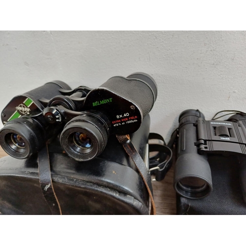 622 - Two cased pairs of binoculars, one Swift Belmont 8 x 40 and one Rocktrail 10 x 25 pocket