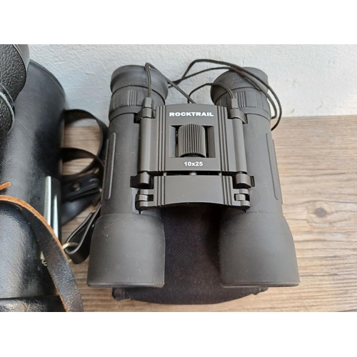 622 - Two cased pairs of binoculars, one Swift Belmont 8 x 40 and one Rocktrail 10 x 25 pocket