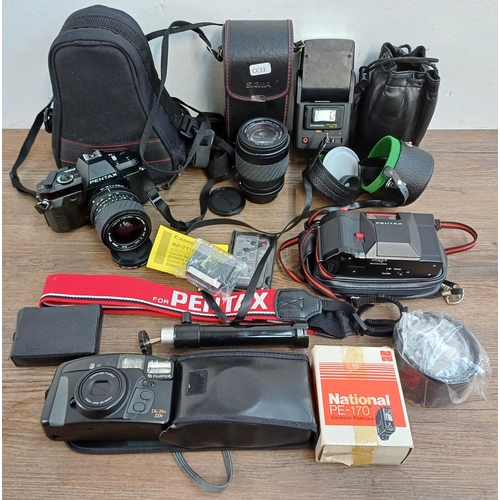 628 - A collection of cameras and accessories to include cased Pentax P30N 35mm SLR fitted with Sigma 1:3.... 