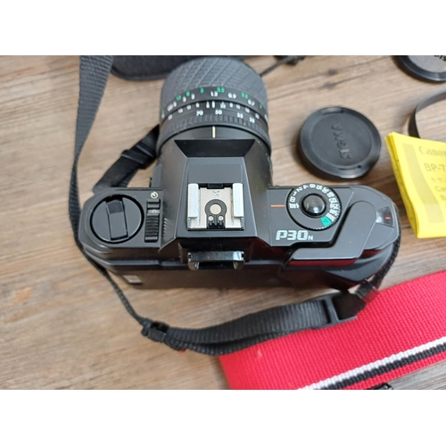 628 - A collection of cameras and accessories to include cased Pentax P30N 35mm SLR fitted with Sigma 1:3.... 